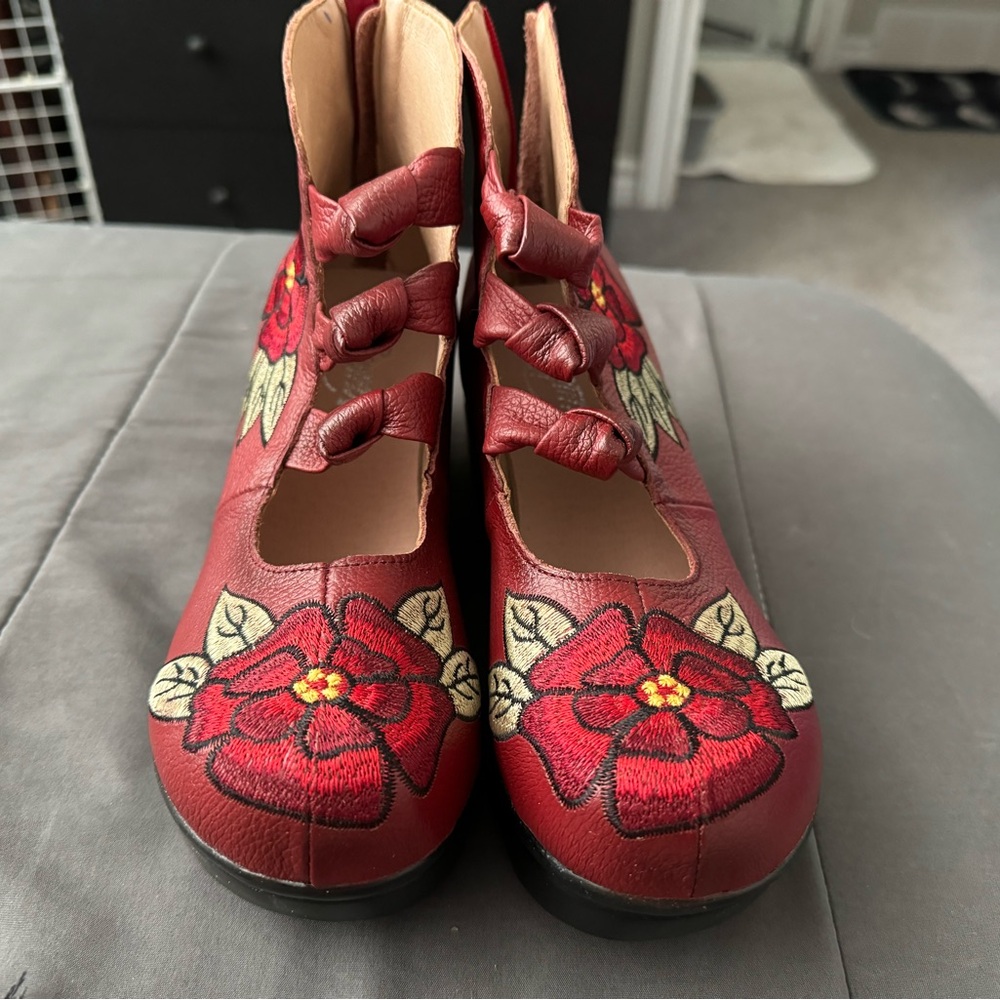 Brand new red boots purchased on NewChic. Leather. Never worn